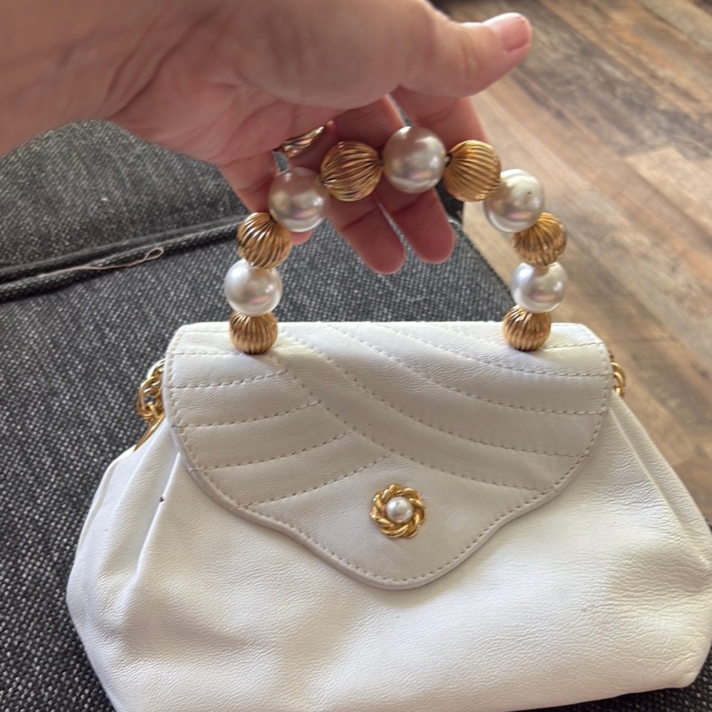 Crowlets mini Italy made Leather with gold dual use.